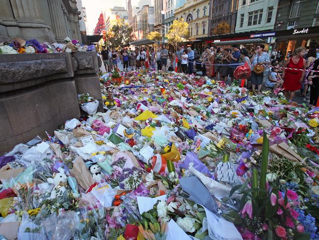 Public outpouring... A floral memorial in Bourke Street. Picture: David Crosling