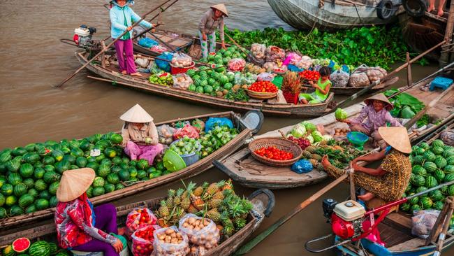 The best time to travel on the Mekong River…Is around early December to March. At that time the rain stops. I don’t recommend people book a Mekong cruise in April or May because the weather in Cambodia is extremely hot then and I don’t think you would enjoy the holiday even if you stayed on the cruise ship.River life changes…When you cross the border from Cambodia to Vietnam. Firstly, there’s a lot less traffic on the river in the Cambodia portion. After seeing almost no traffic when you’re there, after you cruise into Vietnam you will see hundreds of fishing boats, cargo boats and sand barges. There are also a lot more houses, rice fields and a lot of fish farms. When you cross the border you’re in another world.