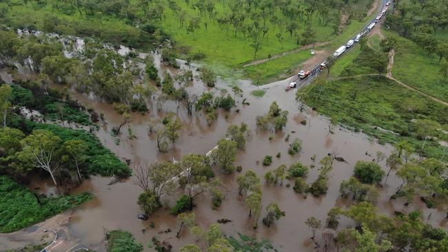 Several Fire and Rescue Service (FRS) crews, including specialised swiftwater rescue technicians, responded to a car in floodwater. Picture: QFES