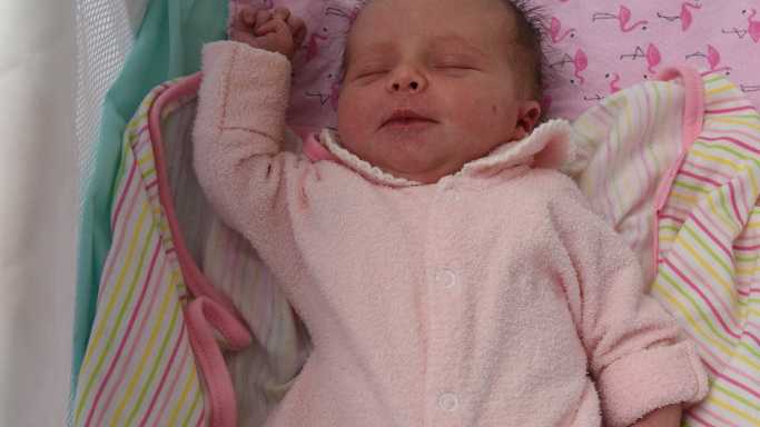 Surprise! Baby born on kitchen floor | The Courier Mail