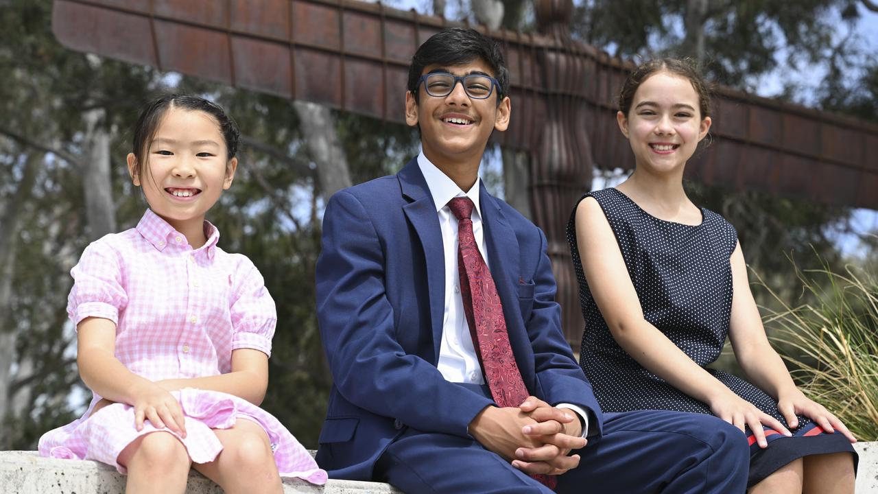 National Champions Aditya Paul (centre), Echo Feng (left) and Jillian Strong (right) were the victors across three age brackets, green (Years 3-4), orange (Years 5-6) and red (Years 7-8). Picture: NewsWire / Martin Ollman