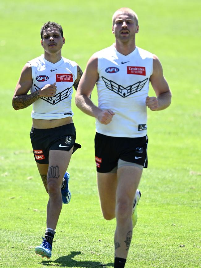 Premiership duo Bobby Hill (left) and Billy Frampton are put through their paces during pre-season training at Victoria Park on Monday. Picture: Quinn Rooney / Getty Images