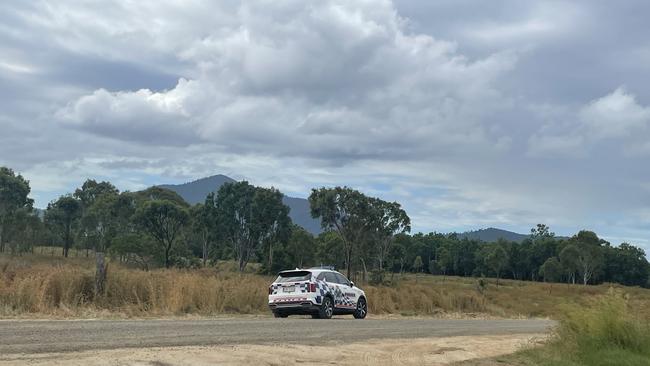 A police car parked on Station Rd which last week responded to reports of a man falling 20 metres from a wind measuring tower. Picture: Estelle Sanchez