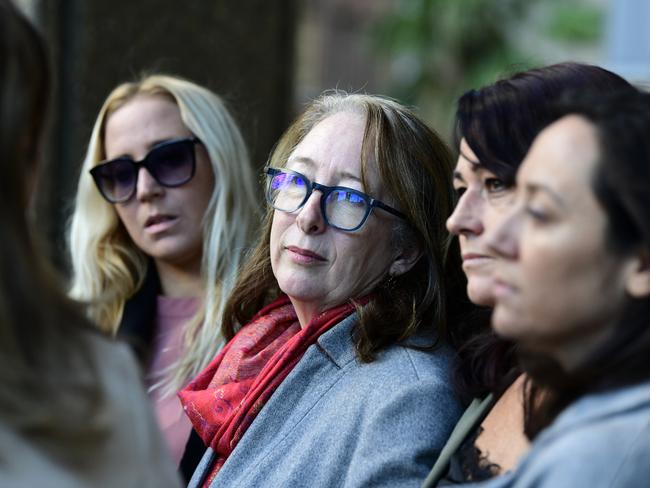 Ms Daly (left) with Samantha’s mother Tess Knight (middle) flanked by supporters speak to the media outside the NSW Supreme Court Building on Monday. Picture: Bianca De Marchi