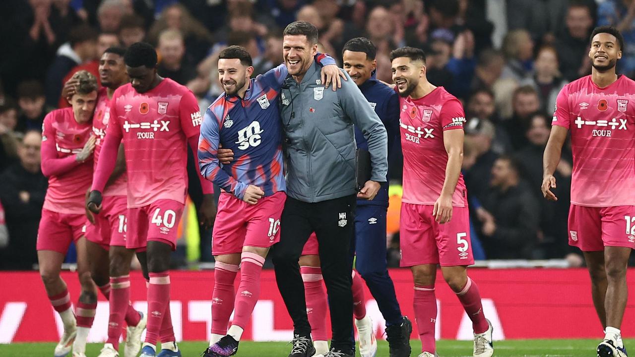 Ipswich's players celebrate. Photo by HENRY NICHOLLS / AFP.