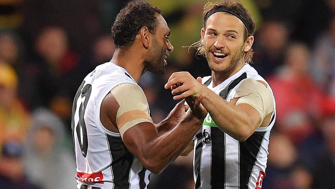 Travis Varcoe of the Magpies and James Aish celebrate a goal for the Magpies. Picture: Getty Images