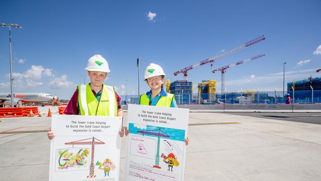 Honey Weate-Riwhi of Tweed Heads Public School and Chayse Kleinhans of St James Catholic School at Banora Point named the two new cranes, “McCranium” and “Straighty McStrong”, at Gold Coast Airport. Photo: Supplied