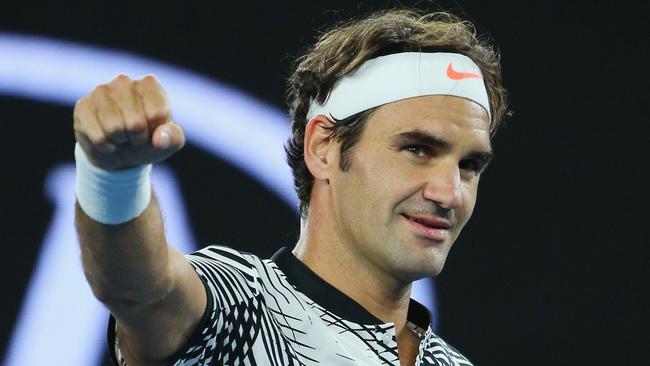 Roger Federer celebrates his third round win over Tomas Berdych. (Photo by Michael Dodge/Getty Images)