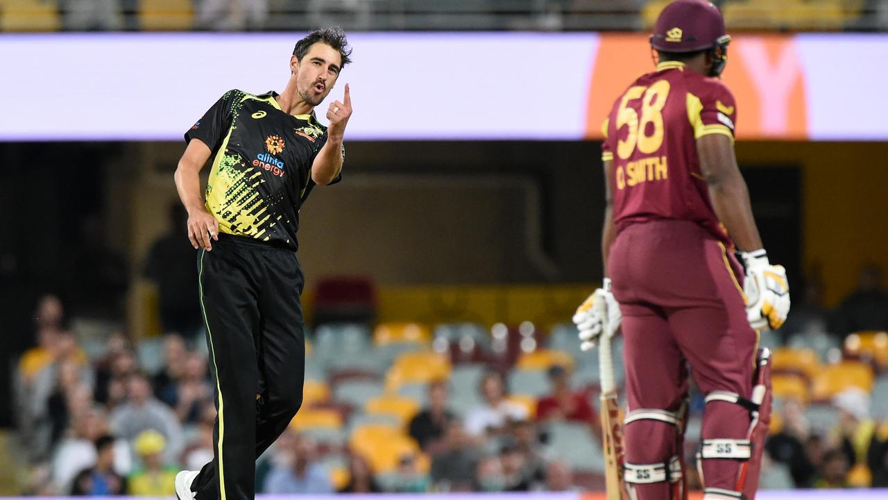 Mitchell Starc of Australia celebrates the wicket of Odean Smith. Photo by Matt Roberts/Getty Images