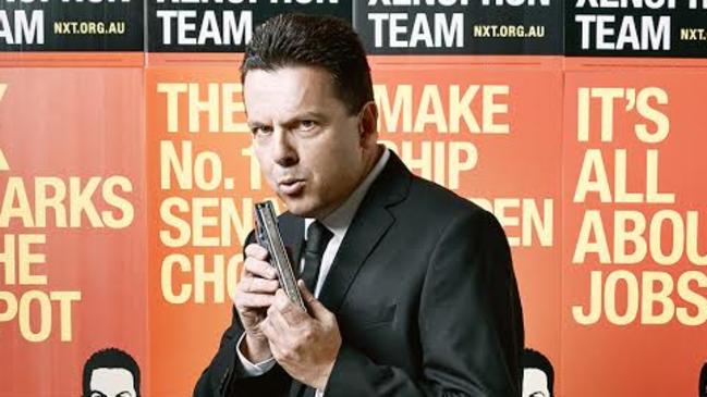 Nick Xenophon’s photo shoot for GQ magazine sees him appear in a $100 outfit as James Bond.