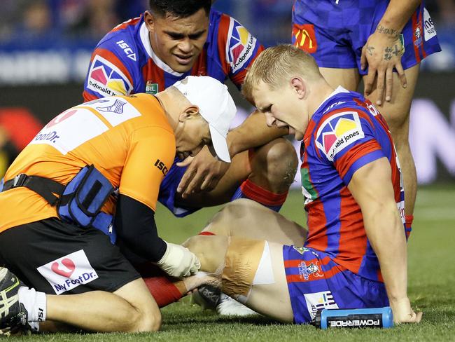 Slade Griffin of the Knights left the field with a serious knee injury during the Round 16 NRL match between the Newcastle Knights and the Canterbury-Bankstown Bulldogs at McDonald Jones Stadium in Newcastle, Saturday, June 30, 2018. (AAP Image/Darren Pateman) NO ARCHIVING, EDITORIAL USE ONLY