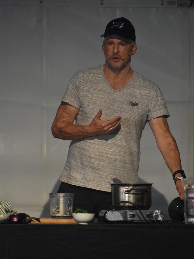 Celebrity chef Matt Golinski prepares food at a cooking demonstration at Relish Food and Wine Festival. Photo: Stuart Fast.