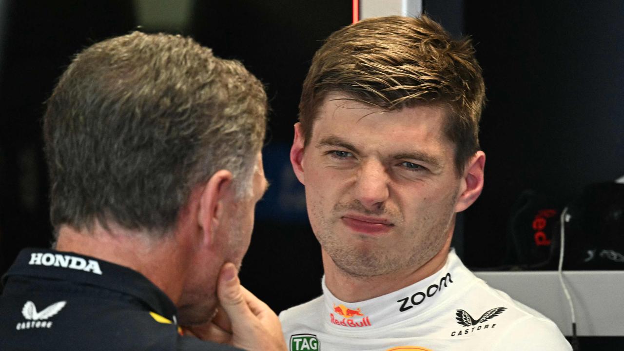 Red Bull Racing's British team principal and CEO Christian Horner (L) and Red Bull Racing's Dutch driver Max Verstappen react after the third practice session, ahead of the Italian Formula One Grand Prix at Autodromo Nazionale Monza circuit, in Monza on August 31, 2024. (Photo by Gabriel BOUYS / AFP)