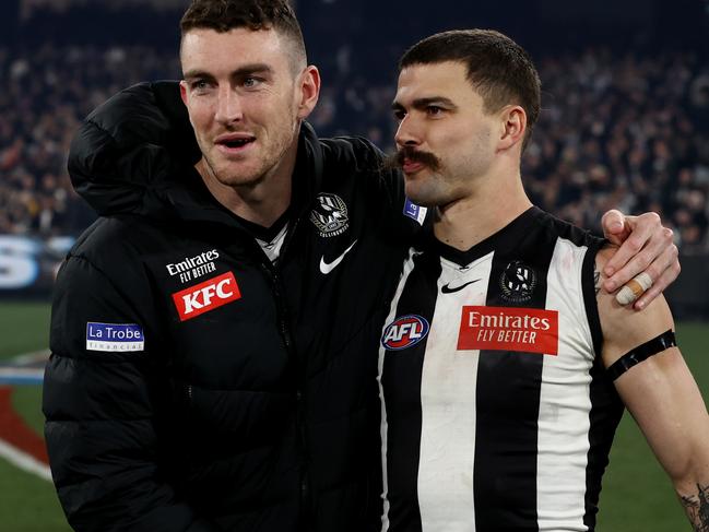 MELBOURNE, AUSTRALIA - September 22, 2023. AFL .   Daniel McStay and Oleg Markov of the Magpies after the 1st preliminary final between Collingwood and the Greater Western Sydney Giants at the MCG in Melbourne, Australia..   Photo by Michael Klein.