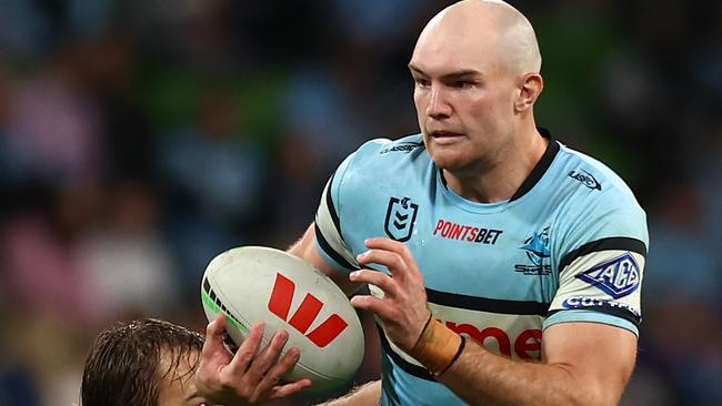 MELBOURNE, AUSTRALIA - MAY 11: Tom Hazelton of the Sharks (R) runs with the ball during the round 10 NRL match between Melbourne Storm and Cronulla Sharks at AAMI Park on May 11, 2024 in Melbourne, Australia. (Photo by Graham Denholm/Getty Images)