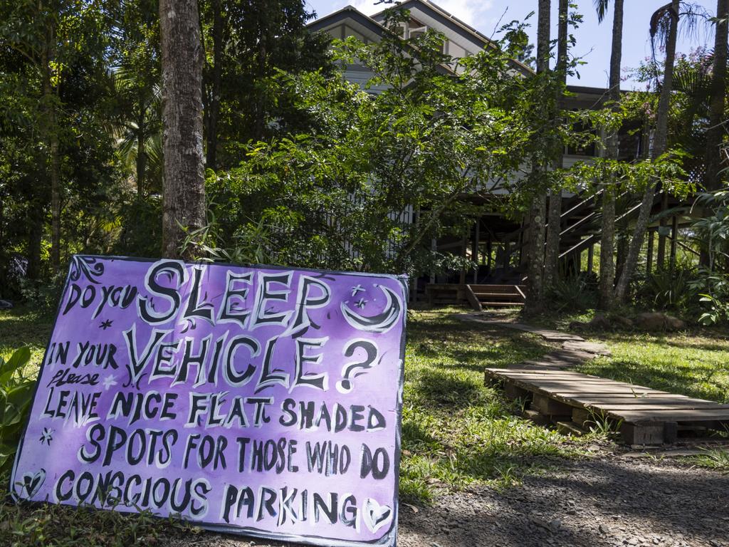 Makeshift signs enforce street rules developed by the squatters. Picture: Media Mode/news.com.au