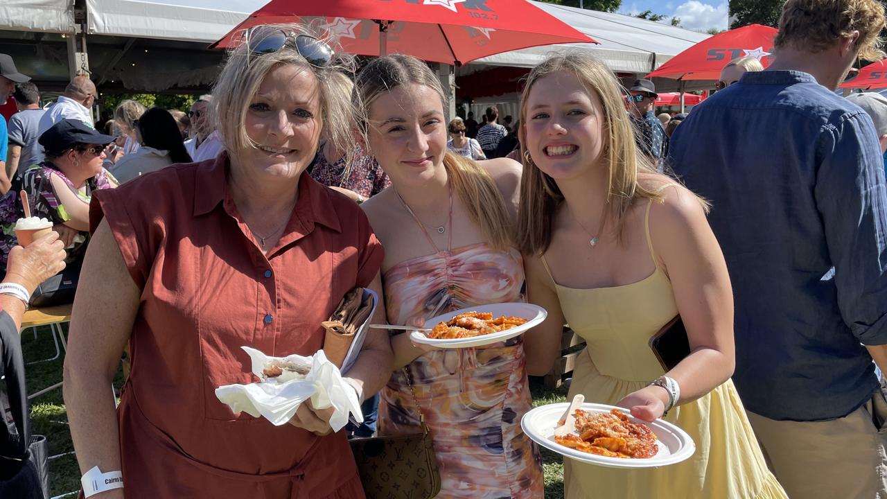 Vanessa Gandini, Genaea Gandini-Palmer (14-years-old) and Emma Porta (13-years-old) at the La Festa - Food and Wine day as part of Cairns Italian Festival at Fogarty Park. Picture: Andreas Nicola