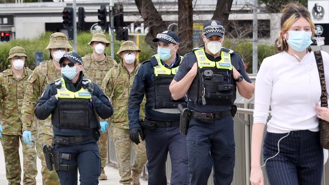 ADF and police patrol along the Yarra in Melbourne on day one of mandatory mask wearing in Melbourne: Picture: David Crosling/NCA NewsWire