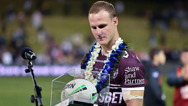 Daly Cherry-Evans is honoured after winning in his 300th NRL game. (Photo by Izhar Khan/Getty Images)