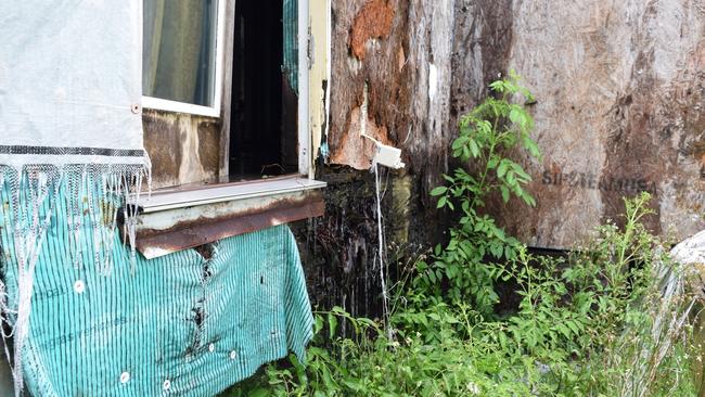 This Make It Right property, next door to Constance Fowler’s house, was abandoned by its owners as it was falling apart. A man and women, who was pregnant, were living there and she was getting sick from the mould. Picture: www.thisischriswhite.com