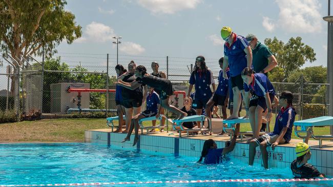 Olympians and scholarship coaches run training sessions for Katherine youth at RAAF Base Tindal. Picture: Pema Tamang Pakhrin