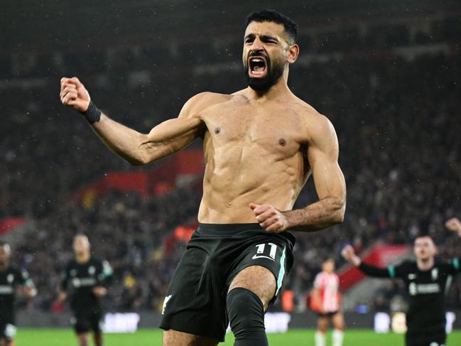 Mohamed Salah celebrates after scoring a penalty goal for Liverpool. Picture: AFP