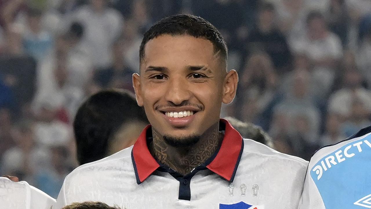 Izquierdo posing for a team photo before the match between 's Nacional and Bolivia's Always Ready back on March 14, 2024. (Photo by EITAN ABRAMOVICH / AFP)