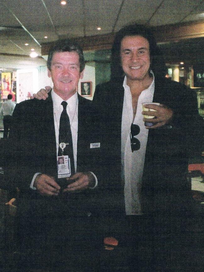 Tom Barber with Gene Simmons before his departure from Melbourne after a book tour in 2002.