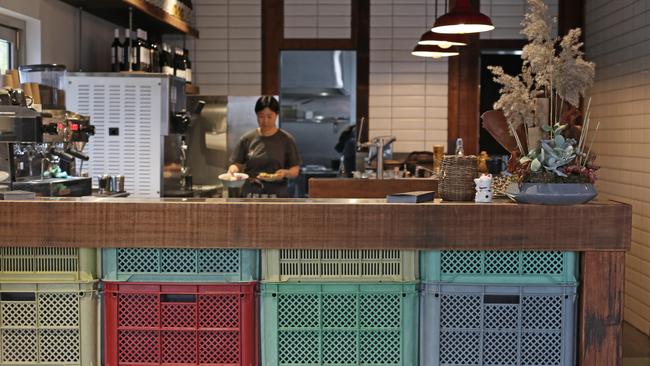 Colourful Japanese fishing crates form the front counter. Picture: LUKE BOWDEN