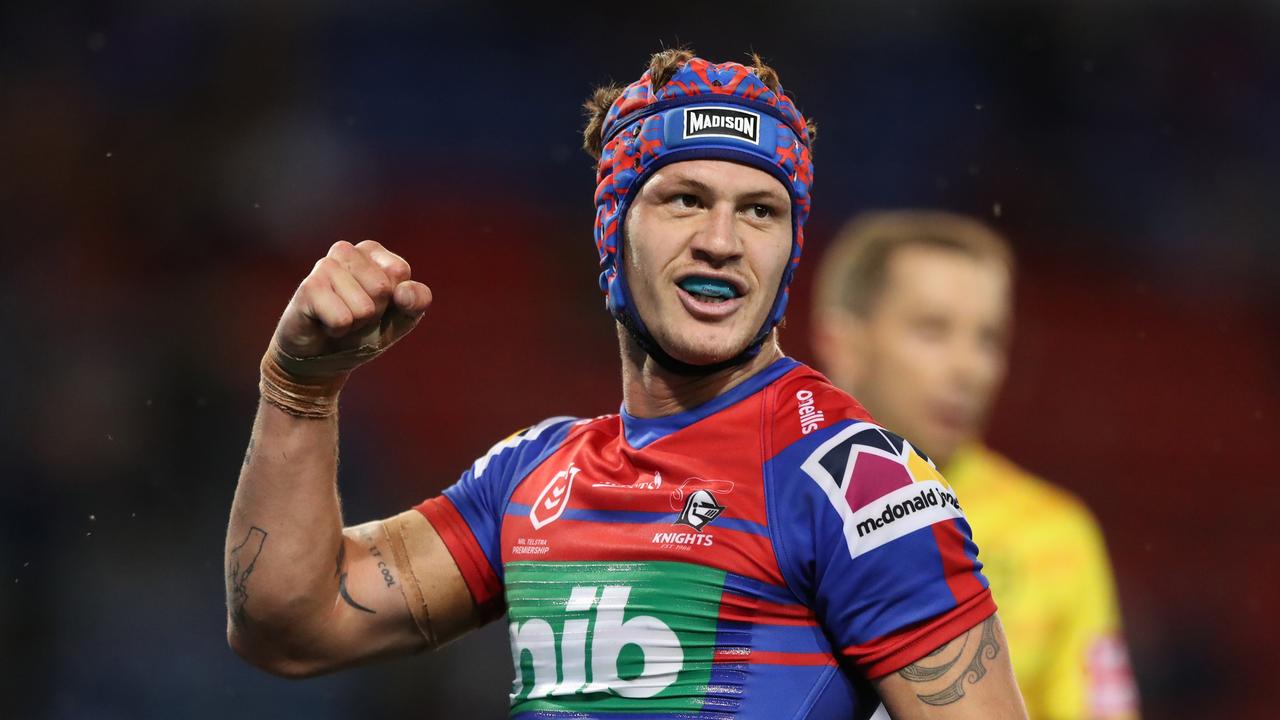 Kalyn Ponga of the Newcastle Knights scores a try.