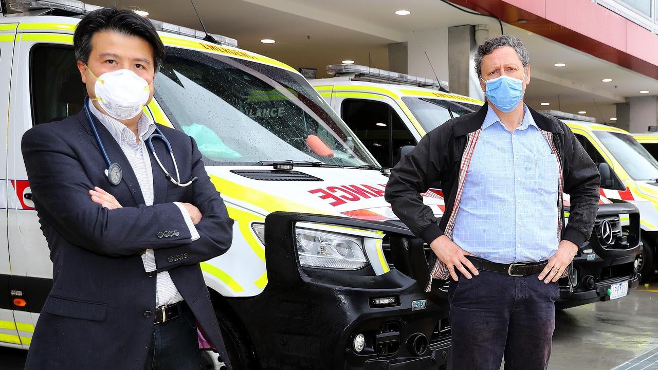 Professor Eugene Athan (right), pictured with GP Bernard Shiu, says contact tracing staff are concerned at the rising number of Covid-19 cases among young people. Picture: Alison Wynd