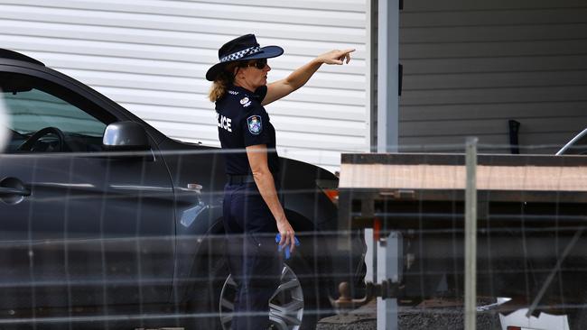 Police at the scene of the an alleged fatal stabbing and police shooting on Friday, April 12. Picture: David Clark