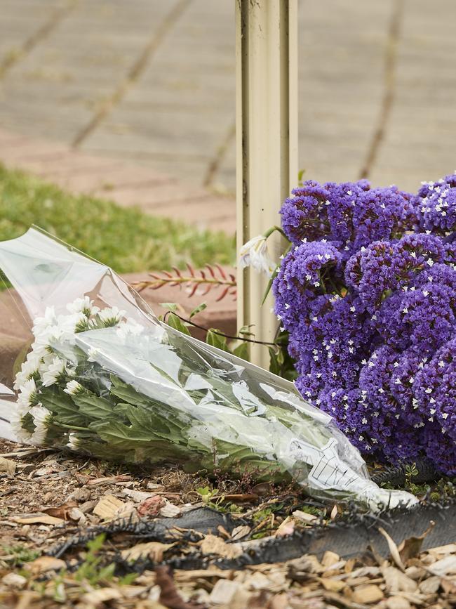 Flowers left outside the home. Picture: Matt Loxton