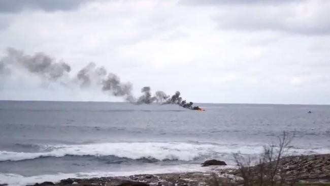 A boat is on fire 350m off Oak Park in Cronulla. Three people have been rescued. Picture: Twitter (https://twitter.com/jonamccallum)