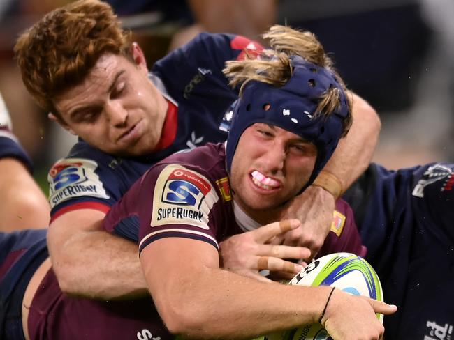 BRISBANE, AUSTRALIA - AUGUST 15: Jock Campbell of the Reds scores a try during the round seven Super Rugby AU match between the Queensland Reds and the Melbourne Rebels at Suncorp Stadium on August 15, 2020 in Brisbane, Australia. (Photo by Albert Perez/Getty Images)