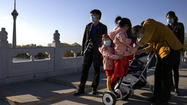 After mass lockdowns of cities across China, the country is beginning to lift its restrictions. Picture: AP/Ng Han Guan