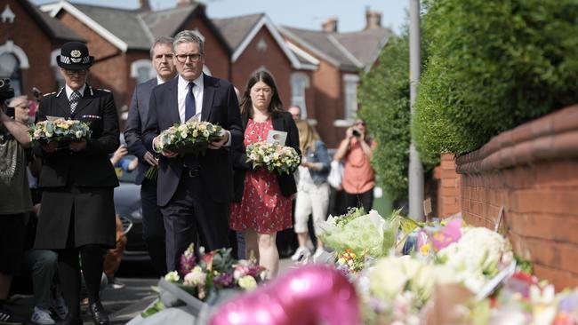 Starmer laid tributes at the scene in Southport where three girls were murdered in a stabbing attack. Picture: Christopher Furlong/Getty Images