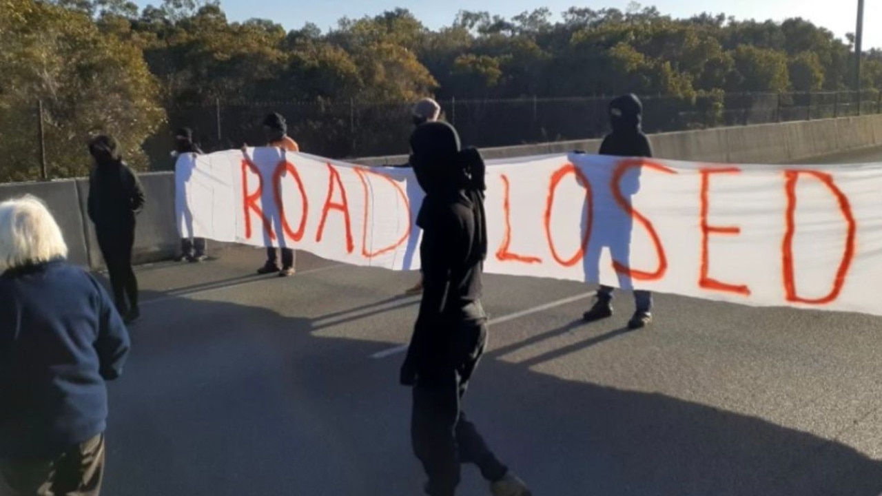 The Port of Brisbane Motorway has been blocked by climate protesters.