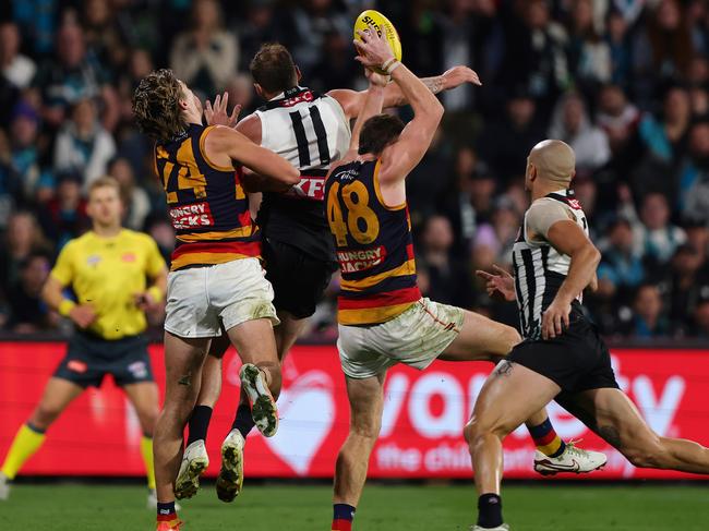 Mark Keane takes the mark which sealed Adelaide’s Showdown win.