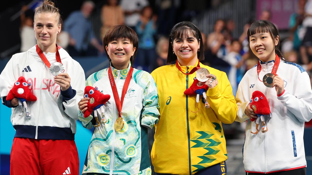 Gold medallist Qian Yang of Team Australia (second left), silver medallist Natalia Partyka, left, and bronze medallists Bruna Alexandre of Team Brazil, second right, and Shiau Wen Tian of Team Chinese Taipei, right. Picture: Michael Reaves/Getty Images