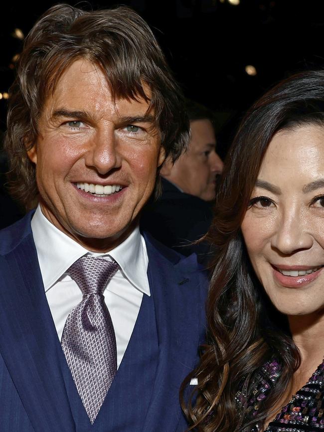 Tom Cruise looked a bit orange when spotted with Michelle Yeoh. Photo by Frazer Harrison/Getty Images.