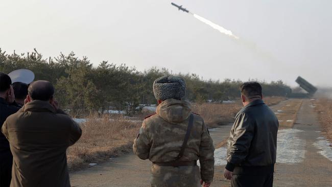 This photo taken on February 14, 2024 and released by North Korea's official Korean Central News Agency (KCNA) on February 15 shows North Korean leader Kim Jong Un (R) inspecting the evaluation test-fire of new-type surface-to-sea missile Padasuri-6 to be equipped by the navy, at an undisclosed location in North Korea. Picture: KCNA via KNS/AFP