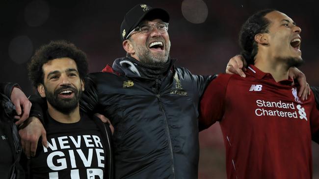 Mohamed Salah, Jurgen Klopp and Virgil van Dijk. Picture: PA via AP