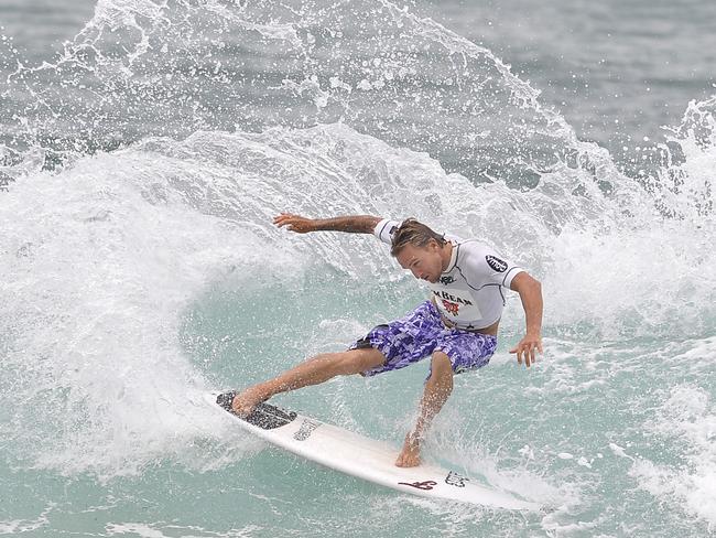 Chris Davidson competing at his home break at North Narrabeen.