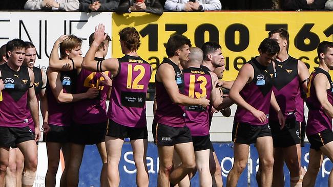 Old Haileybury celebrates a goal in the grand final. Picture: Andrew Batsch