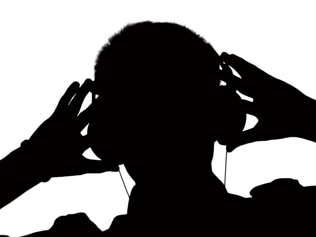 140322 twam Silhouette of man listening to headphones. Pic :Thinkstock Picture: Captioned As