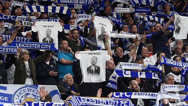 Leicester City fans pay tribute to their late owner. Picture: AFP.