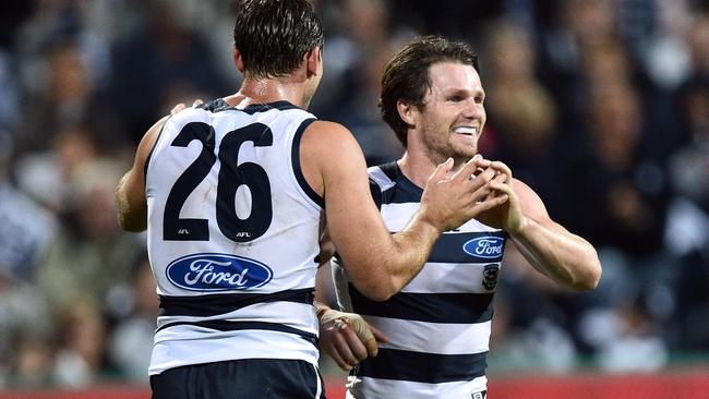 Tom Hawkins and Patrick Dangerfield celebrate a goal for Geelong.