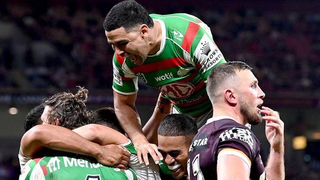 Cody Walker and the Rabbitohs celebrate during their victory. Picture: Getty