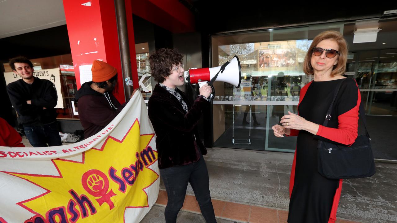 Australian commentator Bettina Arndt is confronted by protesters. Picture: David Geraghty/The Australian